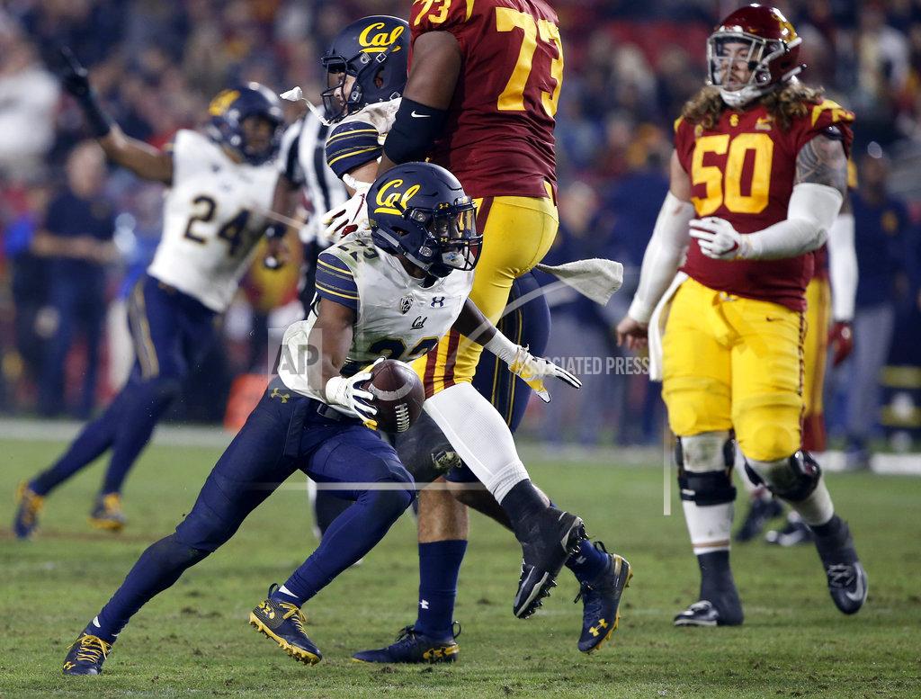 Alex Gallardo California cornerback Traveon Beck (22) celebrates after intercepting a Southern California pass during the second half of an NCAA college football game in Los Angeles, Saturday, Nov. 10, 2018. California won 15-14. (AP Photo/Alex Gallardo)