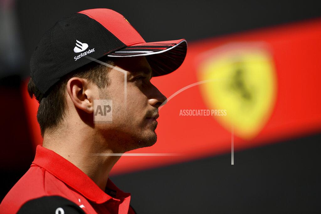 Anna Szilagyi Ferrari driver Charles Leclerc of Monaco walks through peddock at the Hungaroring racetrack in Mogyorod, near Budapest, Hungary, Thursday, July 28, 2022. The Hungarian Formula One Grand Prix will be held on Sunday. (AP Photo/Anna Szilagyi)