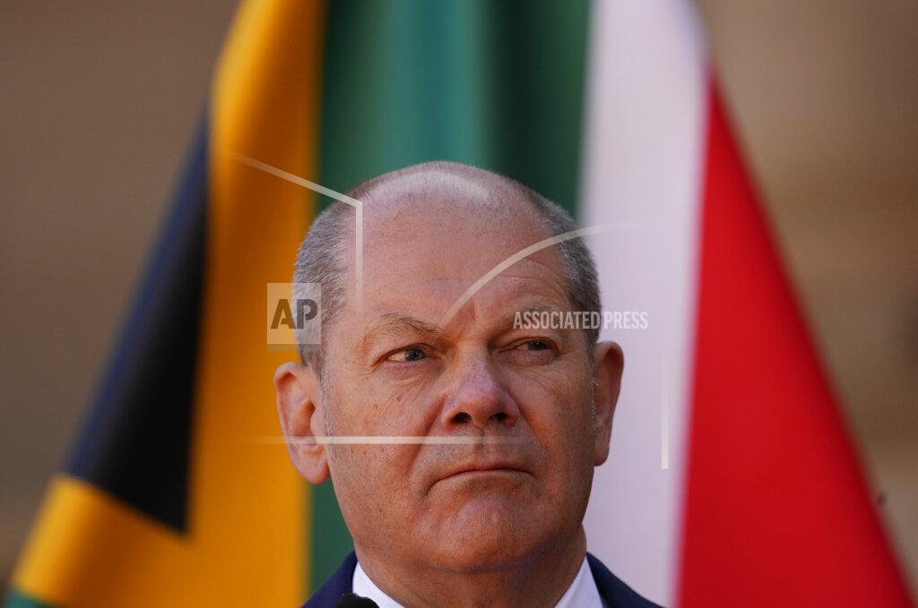 Themba Hadebe German Chancellor Olaf Scholz takes a question during a joint press conference with South Africa President Cyril Ramaphosa at the Union Building in Pretoria, South Africa, Tuesday, May 24, 2022. (AP Photo/Themba Hadebe)