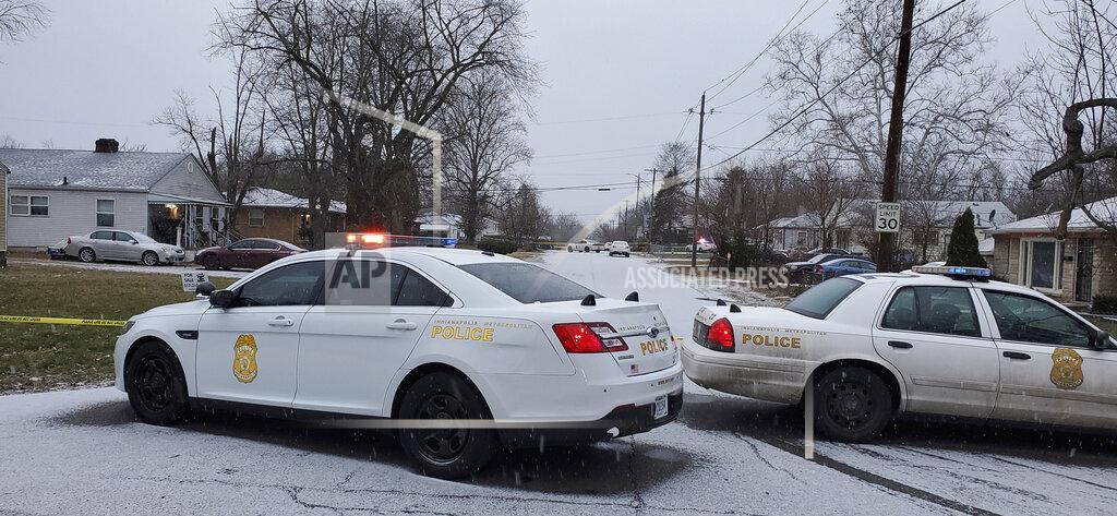 Justin L. Mack Indianapolis Metropolitan Police Department work the scene Sunday, Jan. 24, 2021 in Indianapolis where five people, including a pregnant woman, were shot to death early Sunday inside an Indianapolis home. The pregnant woman who was taken to an area hospital, both she and the unborn child died despite life-saving efforts. (Justin L. Mack/The Indianapolis Star via AP)