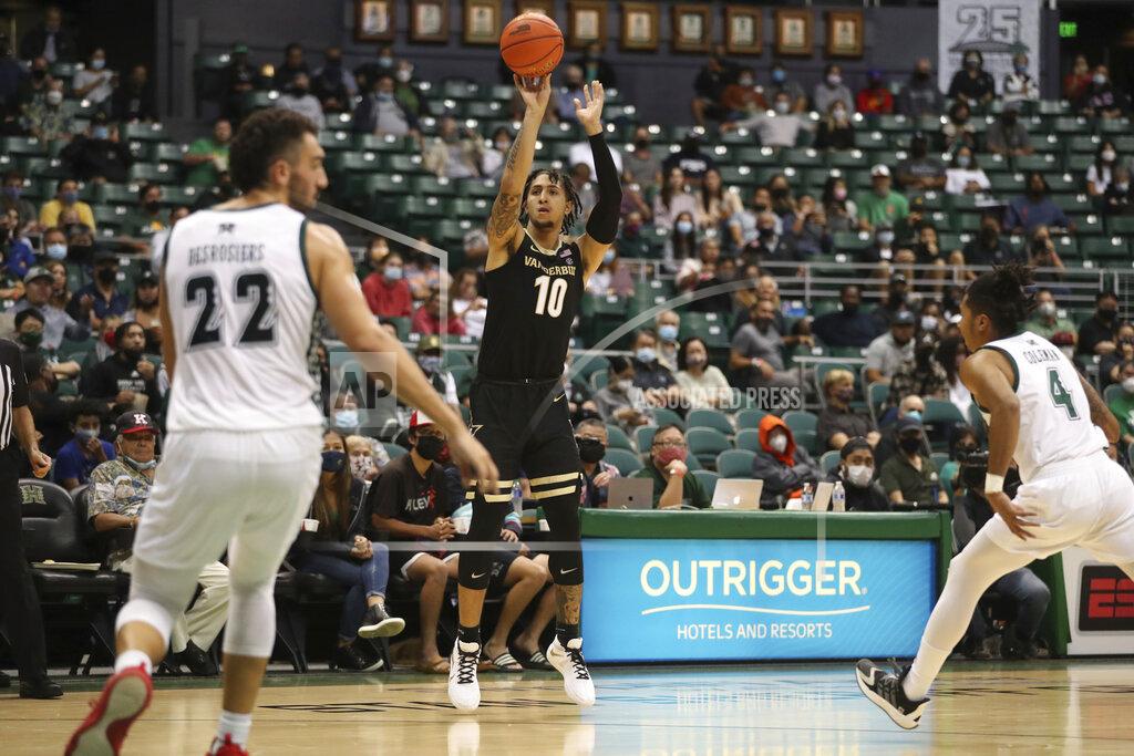 Marco Garcia Vanderbilt forward Myles Stute (10) makes shot over Hawaii in the second half of an NCAA college basketball game Wednesday, Dec. 22, 2021, in Honolulu. (AP Photo/Marco Garcia)