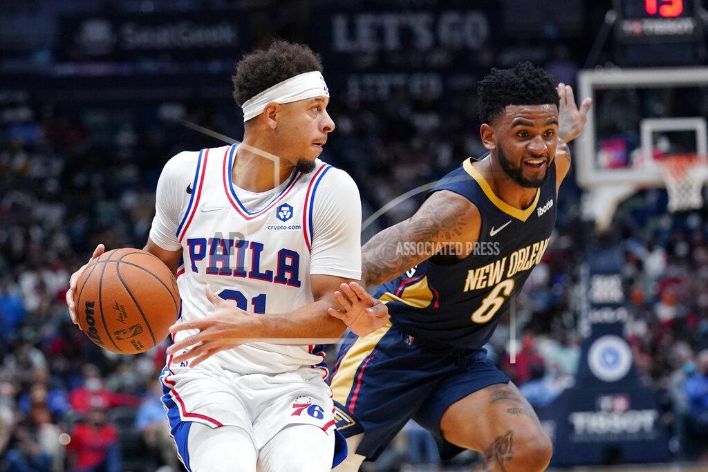 Gerald Herbert Philadelphia 76ers forward Seth Curry dribbles downcourt against New Orleans Pelicans guard Nickeil Alexander-Walker (6) in the first half of an NBA basketball game in New Orleans, Wednesday, Oct. 20, 2021. (AP Photo/Gerald Herbert)