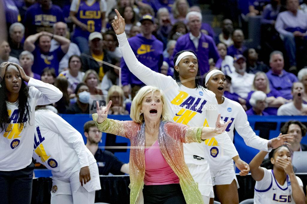 Matthew Hinton LSU head coach Kim Mulkey, center front, reacts to a call during the second half of a women's college basketball game against Ohio State in the second round of the NCAA tournament, Monday, March 21, 2022, in Baton Rouge, La. (AP Photo/Matthew Hinton)