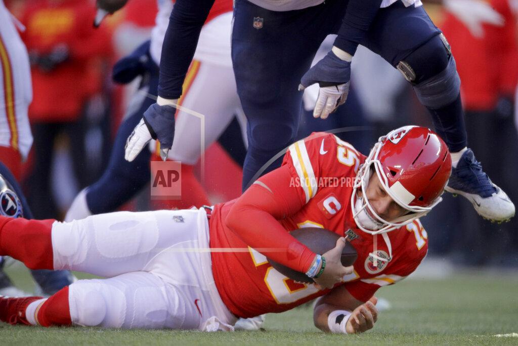 Charlie Riedel Kansas City Chiefs' Patrick Mahomes is stopped during the first half of the NFL AFC Championship football game against the Tennessee Titans Sunday, Jan. 19, 2020, in Kansas City, MO. (AP Photo/Charlie Riedel)