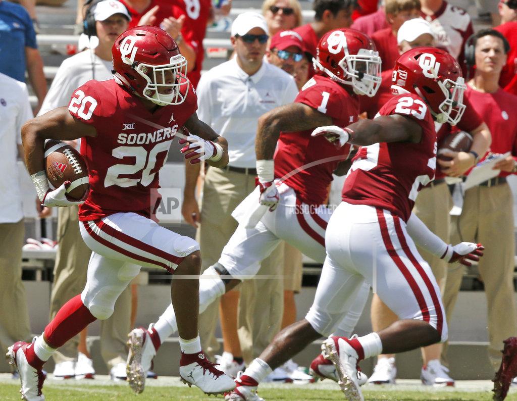 Sue Ogrocki Oklahoma safety Robert Barnes (20) returns an interception 32-yards in the second half of an NCAA college football game against Florida Atlantic in Norman, Okla., Saturday, Sept. 1, 2018. (AP Photo/Sue Ogrocki)