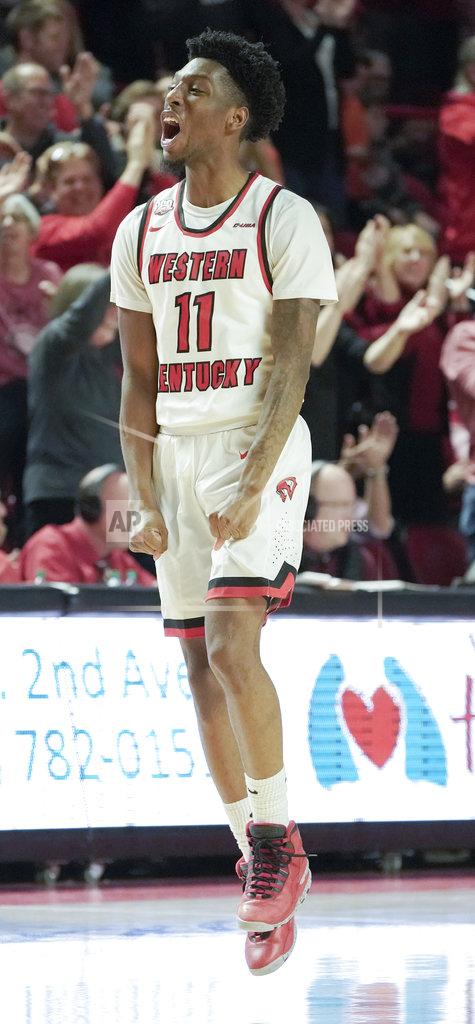 Tim Broekema Western Kentucky guard Taveion Hollingsworth (11) celebrates a 3-point shot during the second half of an NCAA college basketball game against Wisconsin on Saturday, Dec. 29, 2018, in Bowling Green, Ky. (AP Photo/Tim Broekema)