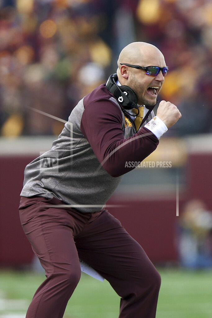 Stacy Bengs FILE - In this Nov. 9, 2019, photo, Minnesota head coach P.J. Fleck cheers his team during an NCAA college football game against Penn Staten in Minneapolis. Fans of Minnesota's Golden Gophers are enjoying football success the team hasn't seen in decades, and daring to dream of a trip to Pasadena. (AP Photo/Stacy Bengs,File)