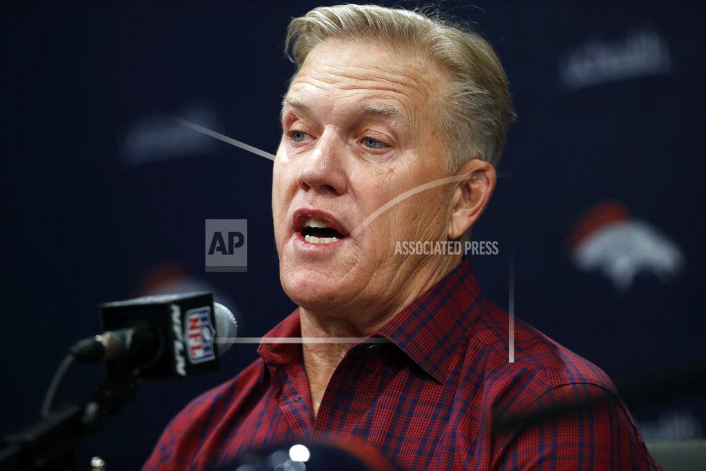 FILE - In this Friday, March 15, 2019, file photo, Denver Broncos general manager John Elway talks to reporters at a news conference at the team's headquarters in Englewood, Colo. Elway’s trade for Joe Flacco in the offseason sets him up to capitalize once again on a draft deep with defensive playmakers. (AP Photo/David Zalubowski, File)