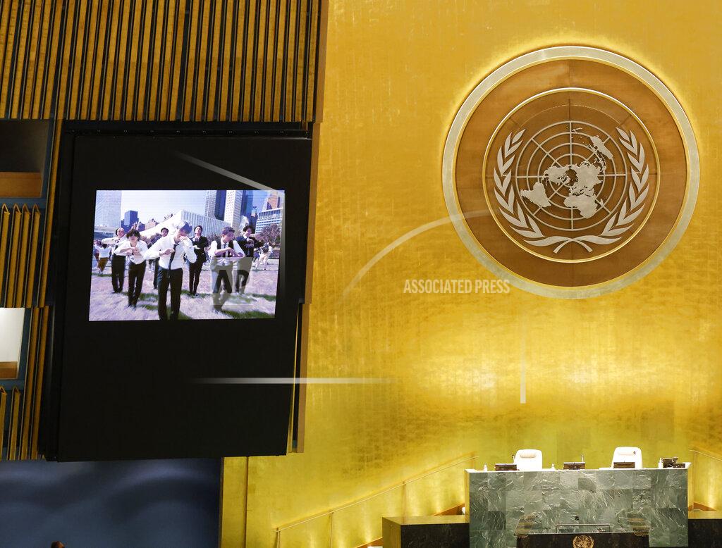 John Angelillo A music video of South Korean K-pop band BTS plays on the General Assembly Hall monitors during the United Nations meeting on Sustainable Development Goals at the 76th session of the U.N. General Assembly at U.N. headquarters on Monday, Sept. 20, 2021. (John Angelillo/Pool Photo via AP)