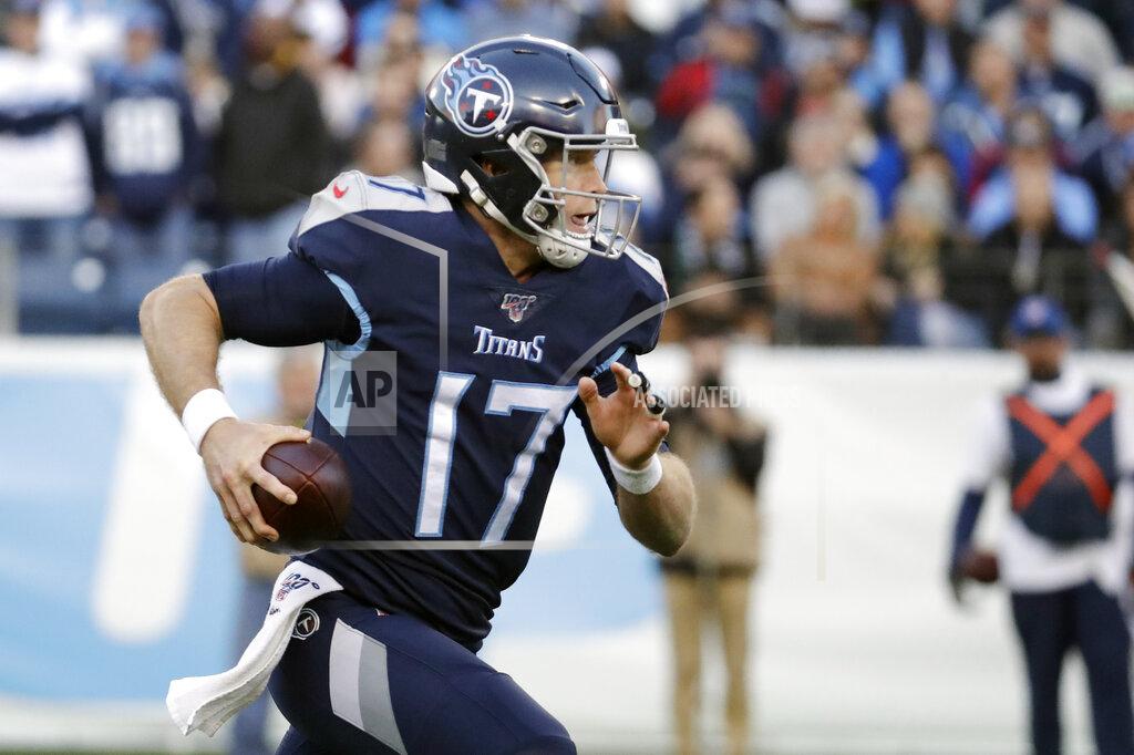 James Kenney Tennessee Titans quarterback Ryan Tannehill runs 21 yards for a touchdown against the Jacksonville Jaguars in the first half of an NFL football game Sunday, Nov. 24, 2019, in Nashville, Tenn. (AP Photo/James Kenney)