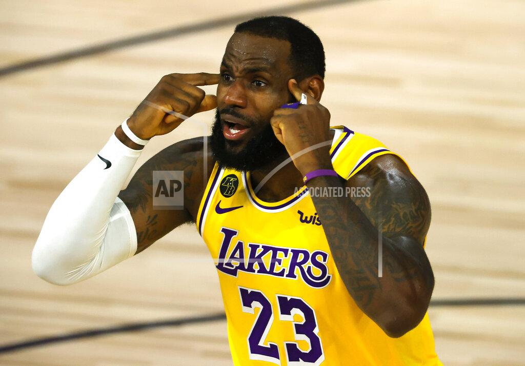 Kevin C. Cox LeBron James of the Los Angeles Lakers reacts against the Oklahoma City Thunder during the second quarter during an NBA basketball game Wednesday, Aug. 5, 2020, in Lake Buena Vista, Fla. (Kevin C. Cox/Pool Photo via AP)