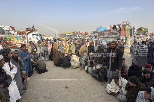 Afghans wait for clearance to depart for their homeland at a deportation camp set up by authorities to facilitate illegal immigrants, in Chaman, a town on the Pakistan-Afghanistan border, Wednesday, Nov. 1, 2023. Pakistani security forces on Wednesday rounded up, detained and deported dozens of Afghans who were living in the country illegally, after a government-set deadline for them to leave expired, authorities said. (AP Photo/Habibullah Achakzai)