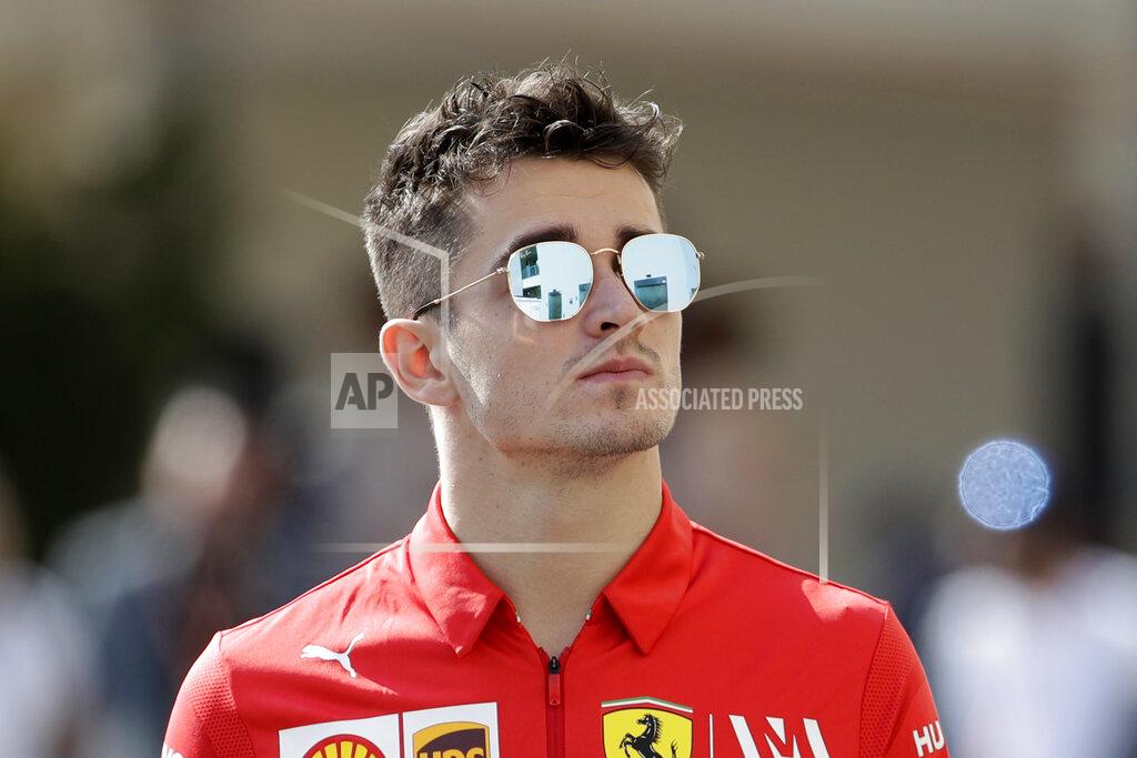 Luca Bruno Ferrari driver Charles Leclerc of Monaco arrives at the Yas Marina racetrack in Abu Dhabi, United Arab Emirates, Thursday, Nov. 28, 2018. The Emirates Formula One Grand Prix will take place on Sunday. (AP Photo/Luca Bruno)