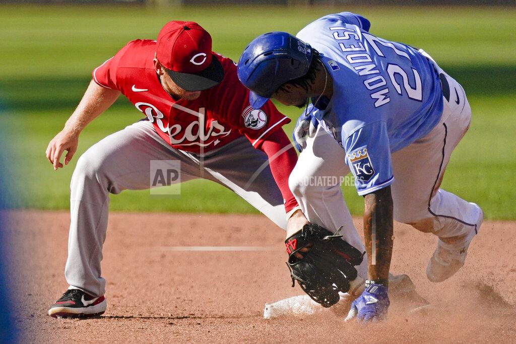 Charlie Riedel Kansas City Royals' Adalberto Mondesi beats the tag by Cincinnati Reds second baseman Josh VanMeter during the fourth inning of game one of a baseball doubleheader Wednesday, Aug. 19, 2020, in Kansas City, Mo. (AP Photo/Charlie Riedel)