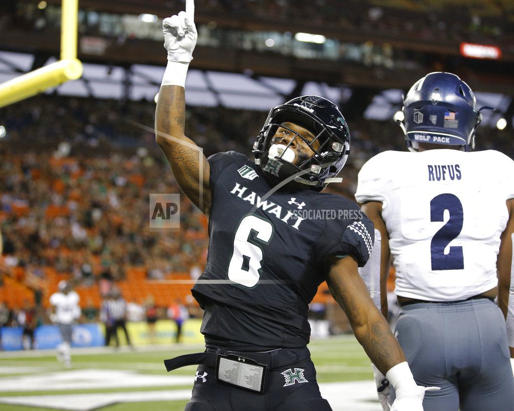 Marco Garcia Hawaii wide receiver Cedric Byrd (6) reacts after making a touchdown against Nevada during the first half of an NCAA college football game Saturday, Oct. 20, 2018, in Honolulu. (AP Photo/Marco Garcia)