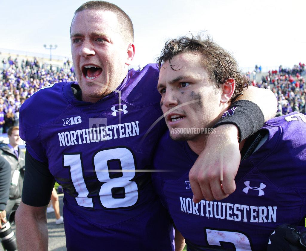 Jim Young Northwestern's Clayton Thorson, left, and Flynn Nagel celebrate their team's win over Nebraska in an NCAA college football game Saturday, Oct. 13, 2018, in Evanston, Ill.. (AP Photo/Jim Young)