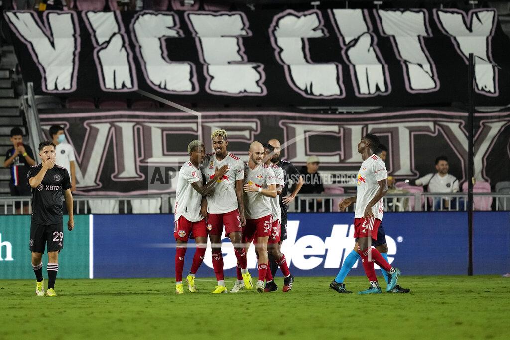 Rebecca Blackwell New York Red Bulls players celebrate a goal by forward Fabio Gomez, center, during the second half of an MLS soccer match against Inter Miami, Friday, Sept. 17, 2021, in Fort Lauderdale, Fla. (AP Photo/Rebecca Blackwell)