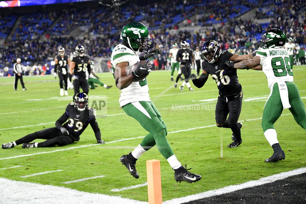 Nick Wass New York Jets wide receiver Jamison Crowder, center, scores on a touchdown pass from quarterback Sam Darnold, not visible, during the second half of an NFL football game against the Baltimore Ravens, Thursday, Dec. 12, 2019, in Baltimore. (AP Photo/Nick Wass)