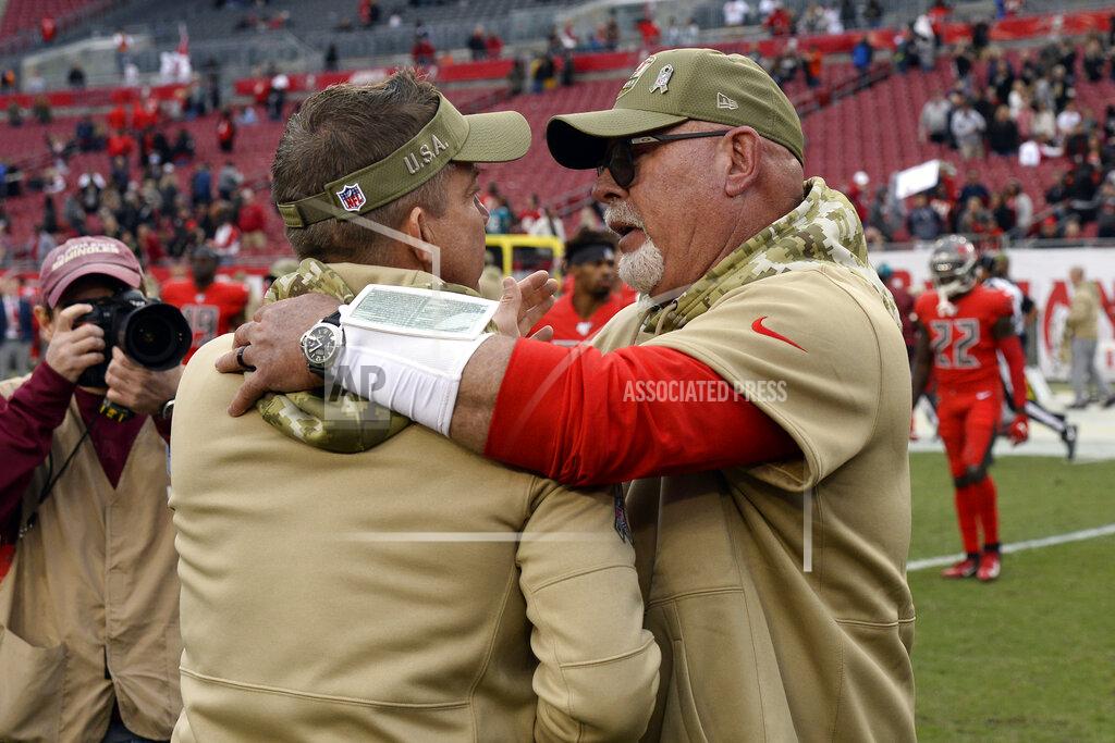 Tampa Bay Buccaneers head coach Bruce Arians, right, congratulates New Orleans Saints head coach Sean Payton after an NFL football game Sunday, Nov. 17, 2019, in Tampa, Fla. (AP Photo/Jason Behnken)
