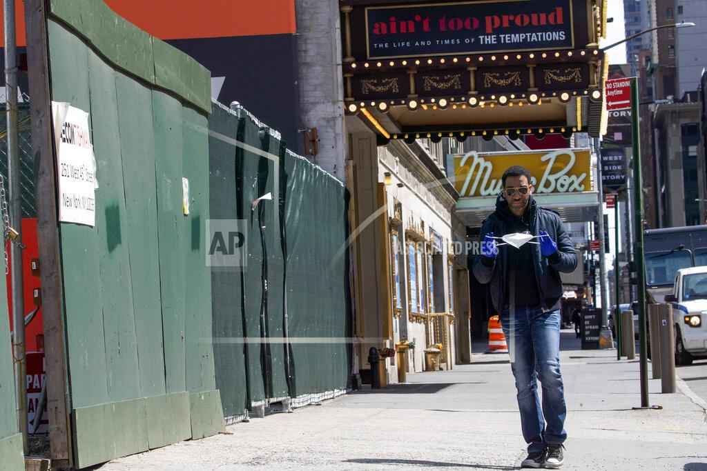 Mary Altaffer FILE - In this April 7, 2020, file photo, Actor E. Clayton Cornelious poses for a portrait at the Imperial Theatre, in New York. He’s looking forward to seeing Broadway reopen. The city is preparing for that to happen this fall. “You can’t take away that live theater feeling,” Cornelious said. “I’m pretty sure that theater is going to survive and people are going to come.” (AP Photo/Mary Altaffer, File)