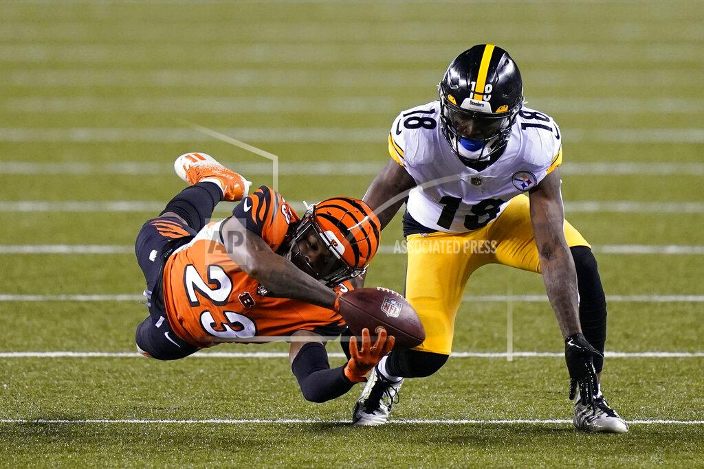Bryan Woolston Cincinnati Bengals' Darius Phillips (23) breaks up a pass intended for Pittsburgh Steelers' Diontae Johnson (18) during the first half of an NFL football game, Monday, Dec. 21, 2020, in Cincinnati. (AP Photo/Bryan Woolston)