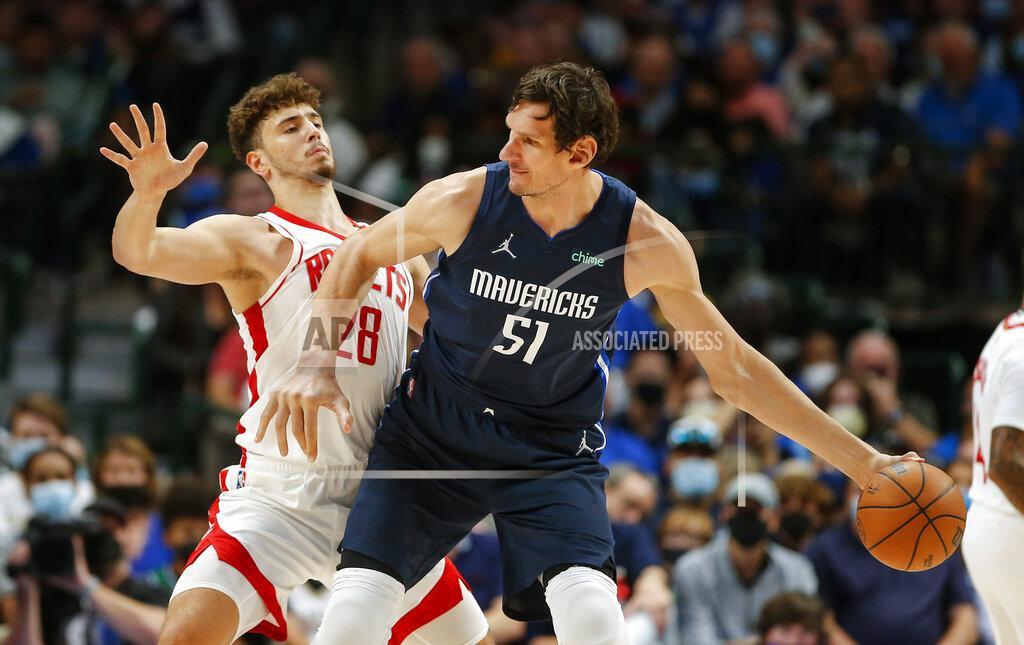 Brandon Wade Dallas Mavericks forward Boban Marjanovic (51) battles Houston Rockets forward Alperen Sengun (28) for space during the second half of an NBA basketball game, Tuesday, Oct. 26, 2021, in Dallas. Dallas won 116-106. (AP Photo/Brandon Wade)