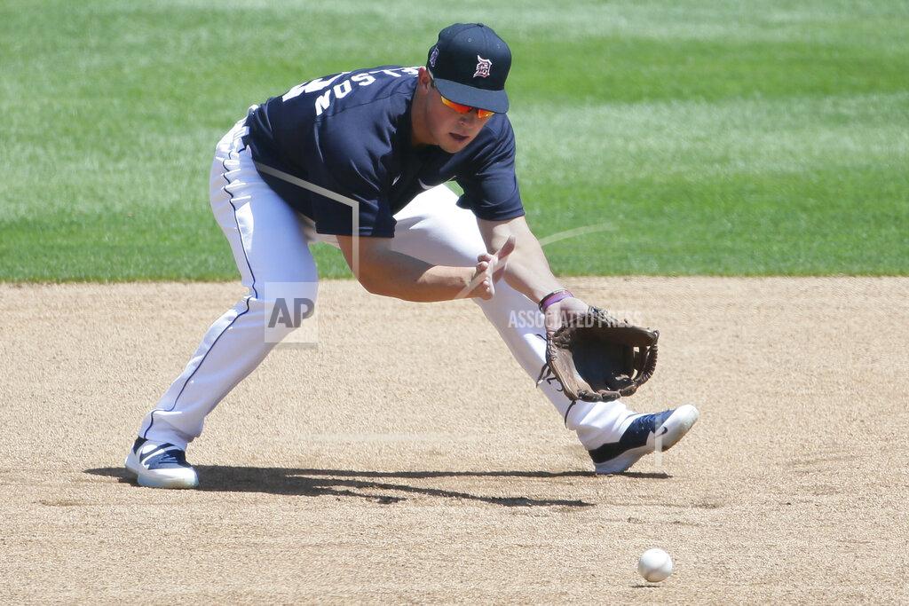 Duane Burleson Detroit Tigers' Spencer Torkelson fields a ground ball during baseball training camp at Comerica Park, Saturday, July 4, 2020, in Detroit. (AP Photo/Duane Burleson)