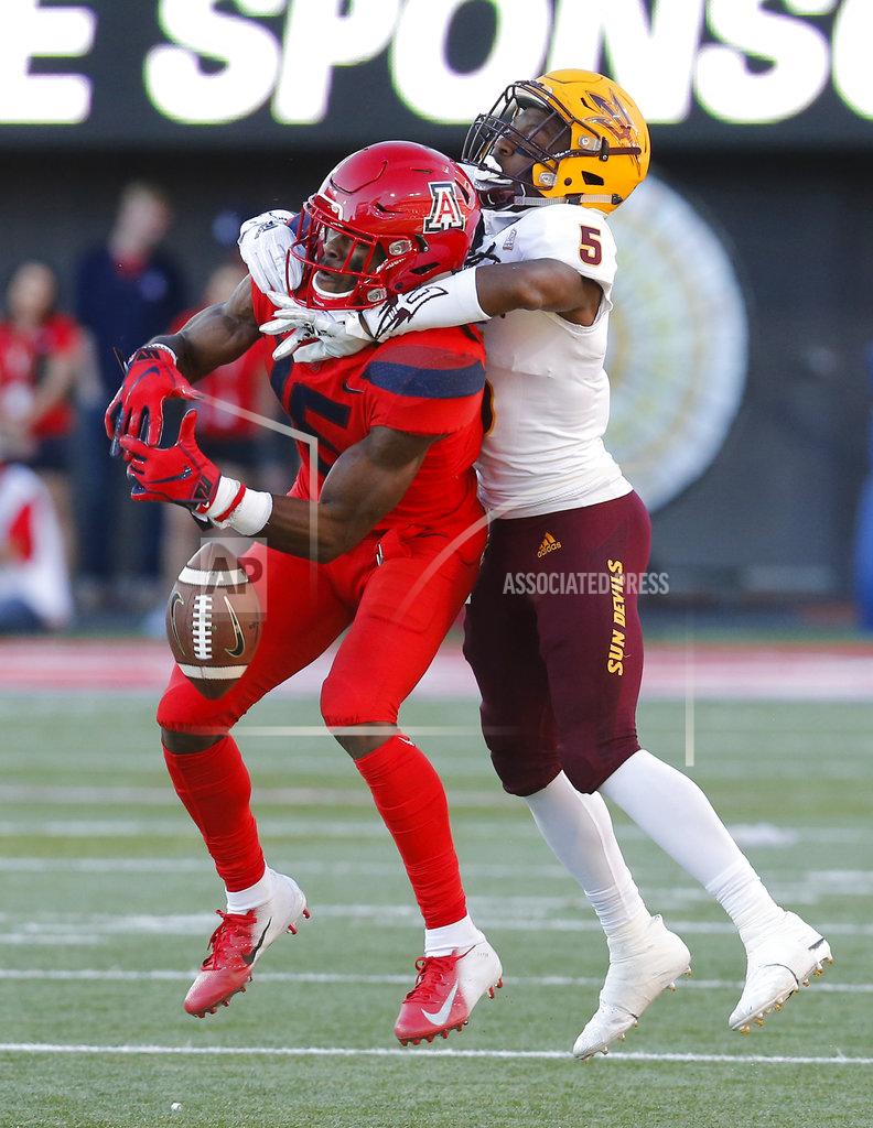 Rick Scuteri Arizona State defensive back Kobe Williams (5) breaks up a pass intended for Arizona wide receiver Will Gunnell in the second half during an NCAA college football game, Saturday, Nov. 24, 2018, in Tucson, Ariz. (AP Photo/Rick Scuteri)