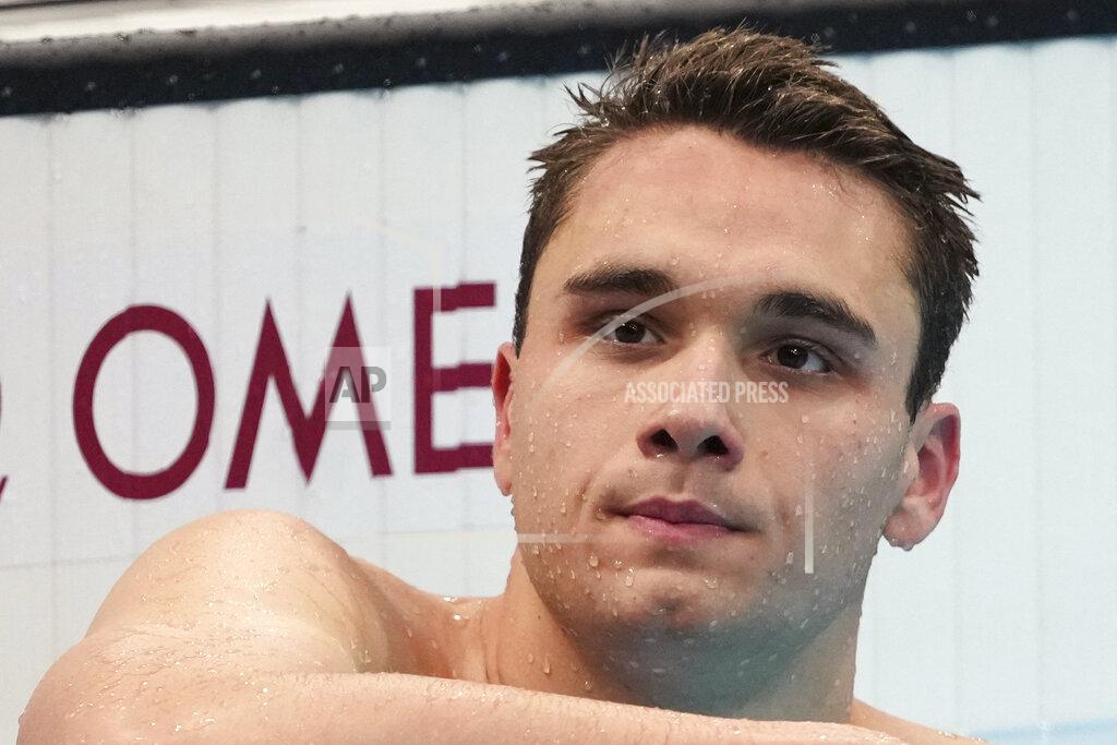 Matthias Schrader Kristof Milak of Hungary rests after winning the men's 200-meter butterfly final at the 2020 Summer Olympics, Wednesday, July 28, 2021, in Tokyo, Japan. (AP Photo/Matthias Schrader)