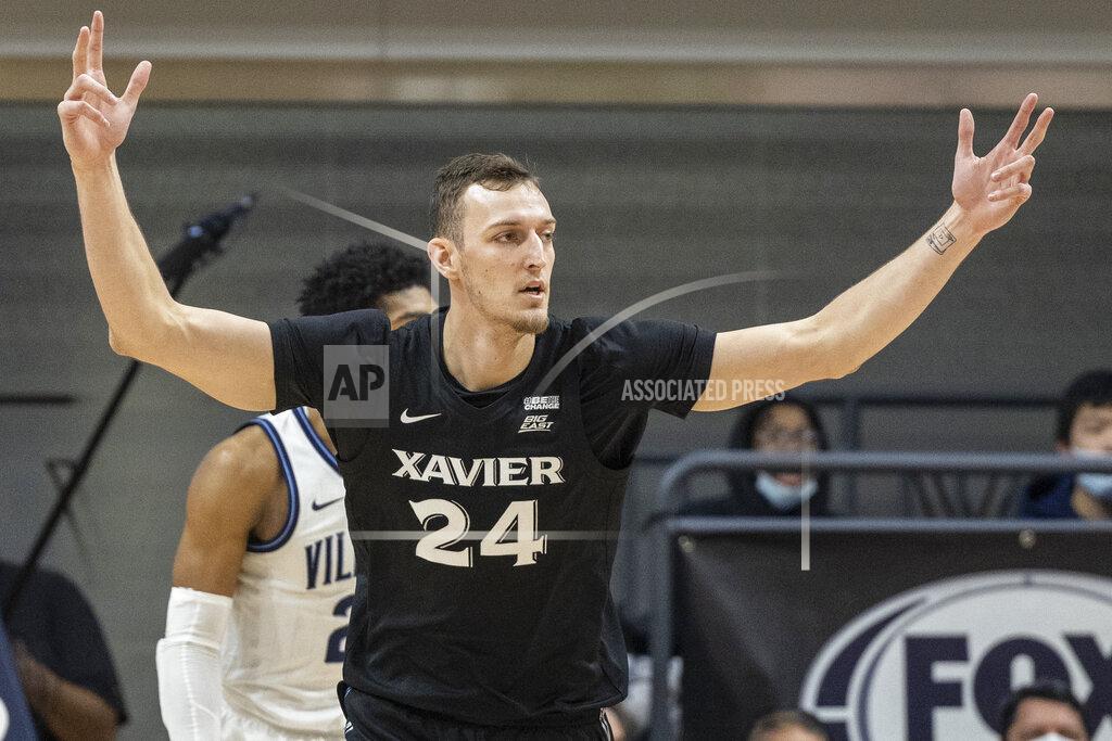 Laurence Kesterson Xavier forward Jack Nunge (24) gestures after making a shot during the first half of the team's NCAA college basketball game against Villanova, Tuesday, Dec. 21, 2021, in Villanova, Pa. (AP Photo/Laurence Kesterson)