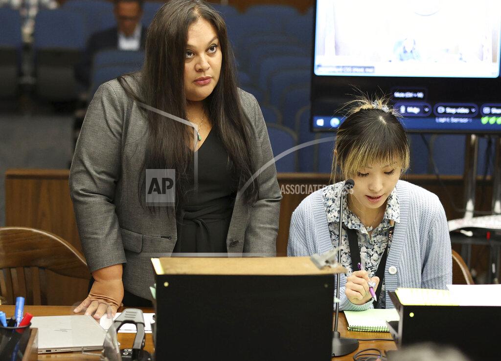 Frederick M. Brown Defense attorney Tania Vallejo speaks during David Chou's appearance before Judge Cynthia M. Herrera in a Santa Ana, Calif., court on Tuesday, May 17, 2022, to be arraigned on capital murder and other charges for the shooting at the Geneva Presbyterian Church in Laguna Woods earlier in the week. (Frederick M. Brown/Daily Mail.com via AP, Pool)