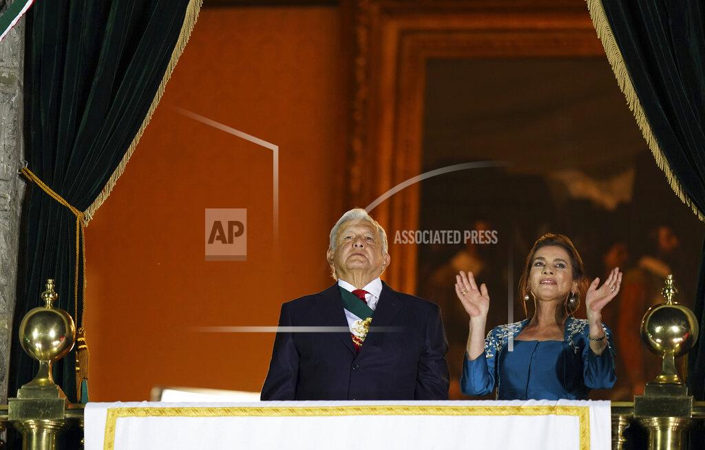 Fernando Llano Mexican President Andres Manuel Lopez Obrador and his wife Beatriz Gutierrez Muller watch the fireworks during Mexico's Independence Day celebrations at the Zocalo in Mexico City, Wednesday, Sept. 15, 2021. (AP Photo/Fernando Llano)