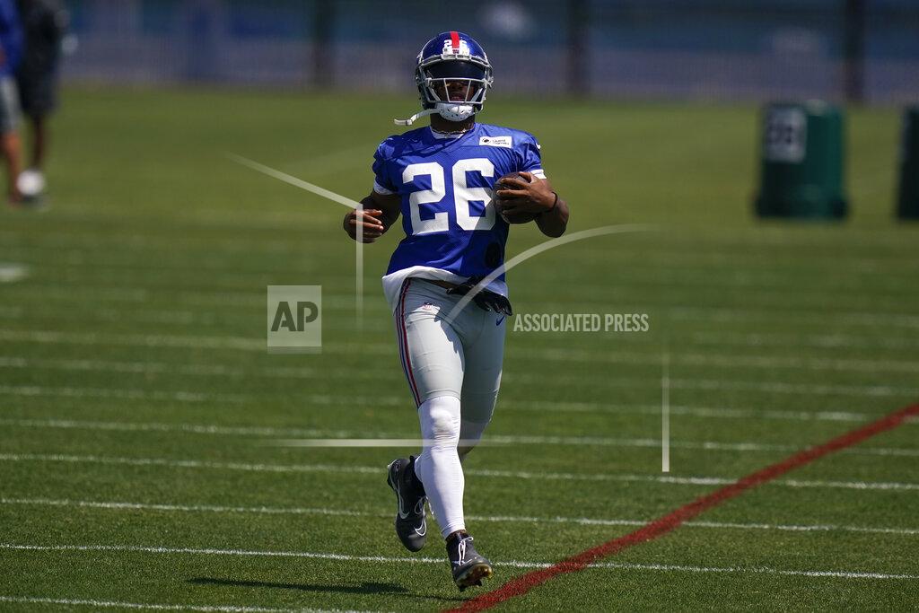 Seth Wenig New York Giants' Saquon Barkley participates in a practice at the NFL football team's training facility in East Rutherford, N.J., Wednesday, June 8, 2022. (AP Photo/Seth Wenig)