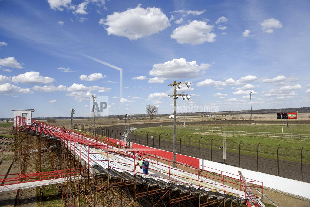 Abigail Dollins This Wednesday, April 22, 2020 photo, dshows Park Jefferson International Speedway in North Sioux City, S.D. The track will practice social distancing while allowing 700 people to attend. The track has sold out of the 700 tickets it offered to a track that usually holds 4,000, for Saturday's race. They are taking steps to reduce the chances that the event will become a hotbed of coronavirus transmission, including keeping the crowds well below capacity, screening people's temperatures and making concessions cashless. (Abigail Dollins/The Argus Leader via AP)