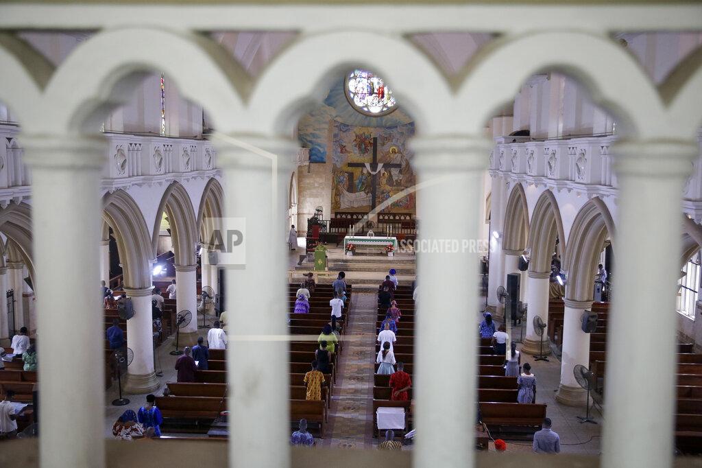 Sunday Alamba The congregation practises social-distancing to curb the spread of the coronavirus during a Sunday mass at the Holy Cross Cathedral in Lagos, Nigeria Sunday, Aug. 30, 2020. The COVID-19 pandemic is testing the patience of some religious leaders across Africa who worry they will lose followers, and funding, as restrictions on gatherings continue. (AP Photo/Sunday Alamba)
