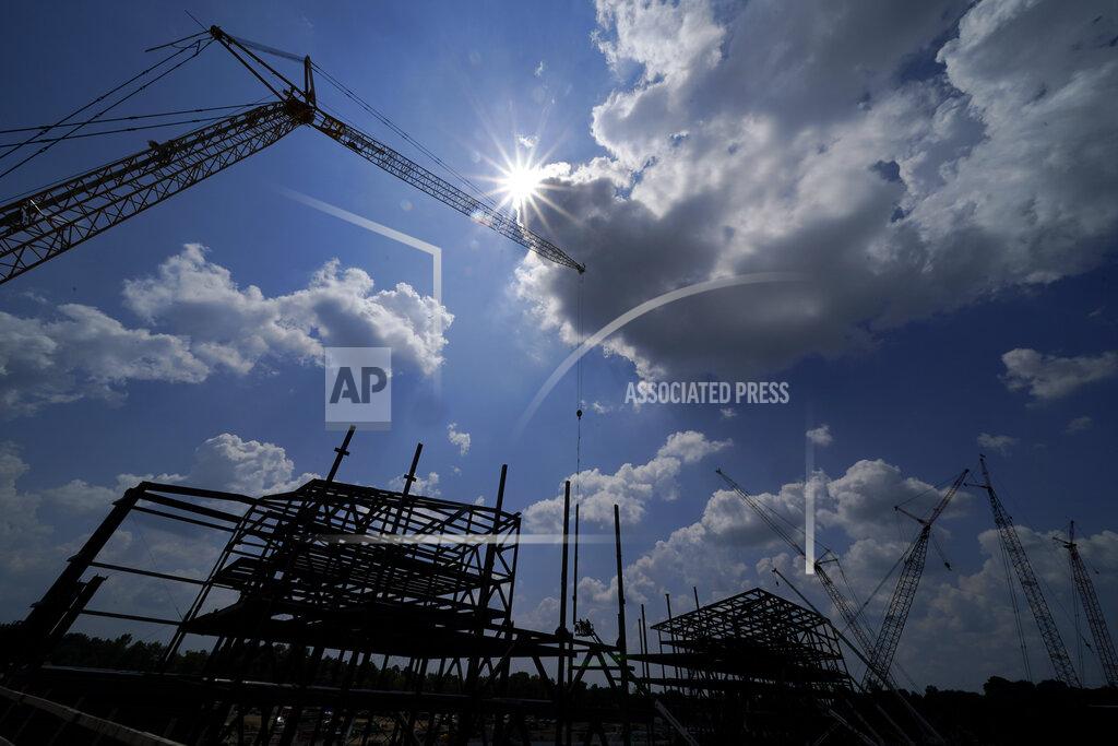 Chris Carlson Construction personnel work on Carolina Panthers' state-of-the-art team headquarters and practice facility Tuesday, Aug. 24, 2021, in Rock Hill, S.C. "The Rock" will host all of the team's offices and training/locker room facilities, along with three outdoor grass practice fields, one indoor artificial field and another outdoor artificial field that is part of a 5,000-seat multipurpose stadium that can also be used to host high school football and soccer games, concerts, car shows and much more. (AP Photo/Chris Carlson)