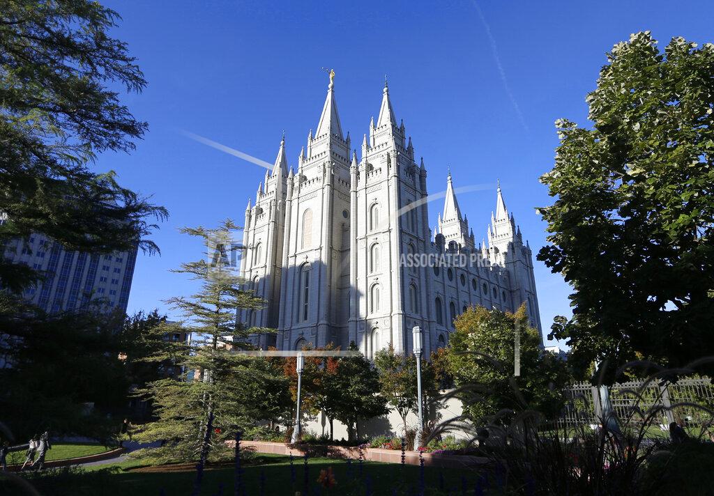 Rick Bowmer FILE - In this Oct. 5, 2019, file photo, The Salt Lake Temple stands at Temple Square in Salt Lake City. The Church of Jesus Christ of Latter-day Saints added new language to the faith's handbook Friday, Dec. 18, 2020, imploring members to root out prejudice and racism, adding significance and permanence to recent comments by top leaders on one of the most sensitive topics in the church's history. (AP Photo/Rick Bowmer, File)