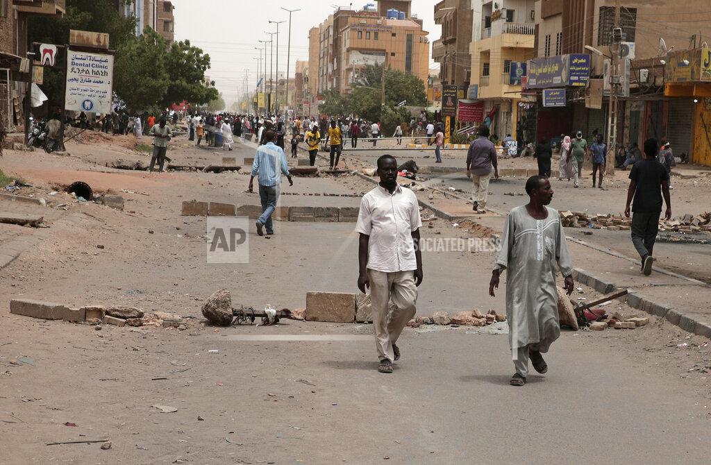 Marwan Ali Protesters block roads during a demonstration demanding a return to civilian rule and to protest the nine people who were killed in anti-military demonstrations last month, in Khartoum, Sudan, Monday, July 4, 2022. (AP Photo/Marwan Ali)