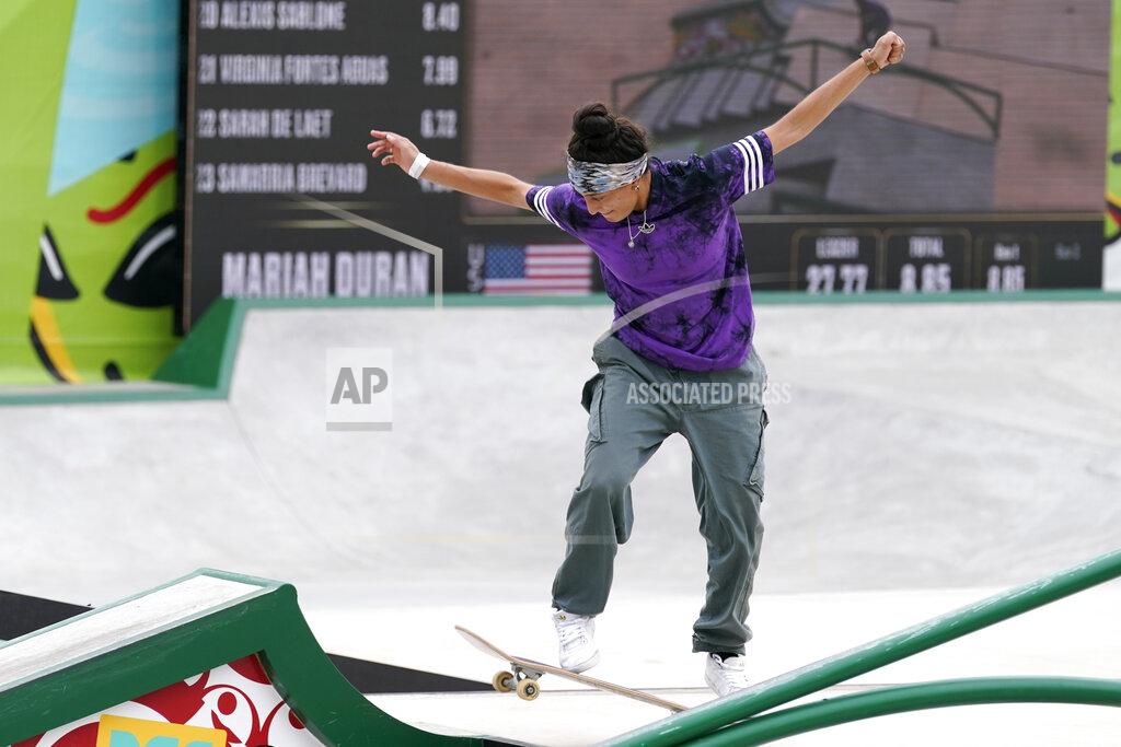 Charlie Neibergall Mariah Duran, of the United States, competes during an Olympic qualifying skateboard event at Lauridsen Skatepark, Saturday, May 22, 2021, in Des Moines, Iowa. The questions under the magnifying glass at this week's Dew Tour — one of the last major qualifying events for the games in Tokyo in July — is whether the Olympics is ready for skateboarding and, more tellingly, whether skateboarding is ready for the Olympics. (AP Photo/Charlie Neibergall)