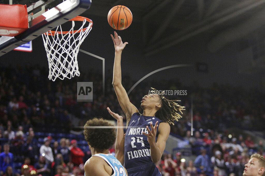 Young Kwak North Florida forward Jadyn Parker (24) shoots during the second half of an NCAA college basketball game against Gonzaga, Monday, Nov. 7, 2022, in Spokane, Wash. Gonzaga won 104-63. (AP Photo/Young Kwak)