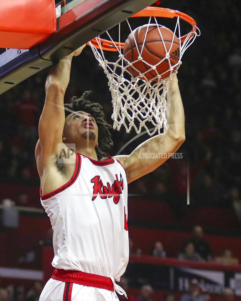 Andrew Mills Rutgers guard Geo Baker (0) scores two of his game-high 22 points during the second half of an NCAA college basketball game against Wisconsin, in Piscataway, N.J., Wednesday, Dec. 11, 2019. (Andrew Mills/NJ Advance Media via AP)