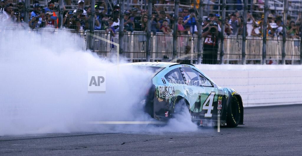Charles Krupa Kevin Harvick smokes his tires for fans after winning a NASCAR Cup Series auto race at New Hampshire Motor Speedway in Loudon, N.H., Sunday, July 21, 2019. (AP Photo/Charles Krupa)