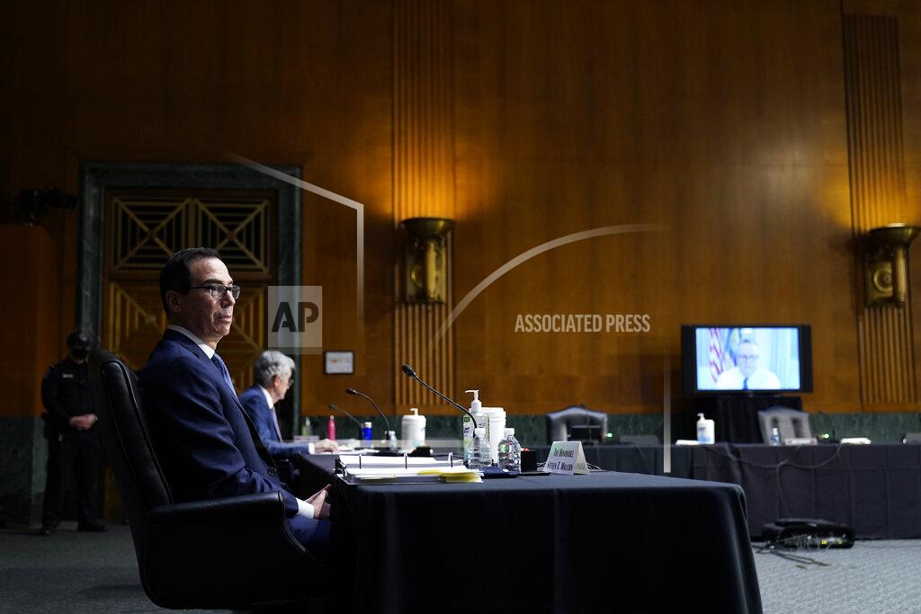 Susan Walsh Sen. Jon Tester, D-Mont., speaks via teleconference as Treasury Secretary Steven Mnuchin and Chairman of the Federal Reserve Jerome Powell testify during a Senate Banking Committee hearing on 'The Quarterly CARES Act Report to Congress' on Capitol Hill in Washington, Tuesday, Dec. 1, 2020. (AP Photo/Susan Walsh, Pool)