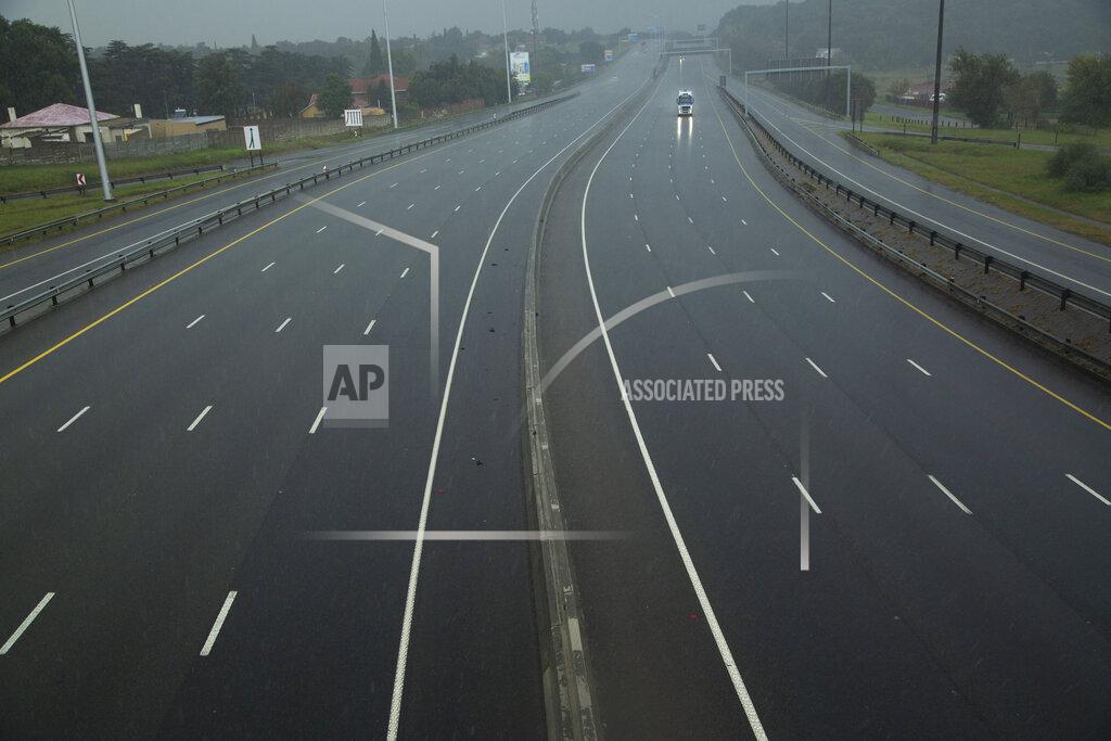 Themba Hadebe A car drives along a motorway in Johannesburg, South Africa, Saturday, April 4, 2020. South Africa went into a nationwide lockdown for 21 days in an effort to control the spread of the coronavirus. The new coronavirus causes mild or moderate symptoms for most people, but for some, especially older adults and people with existing health problems, it can cause more severe illness or death. (AP Photo/Themba Hadebe)