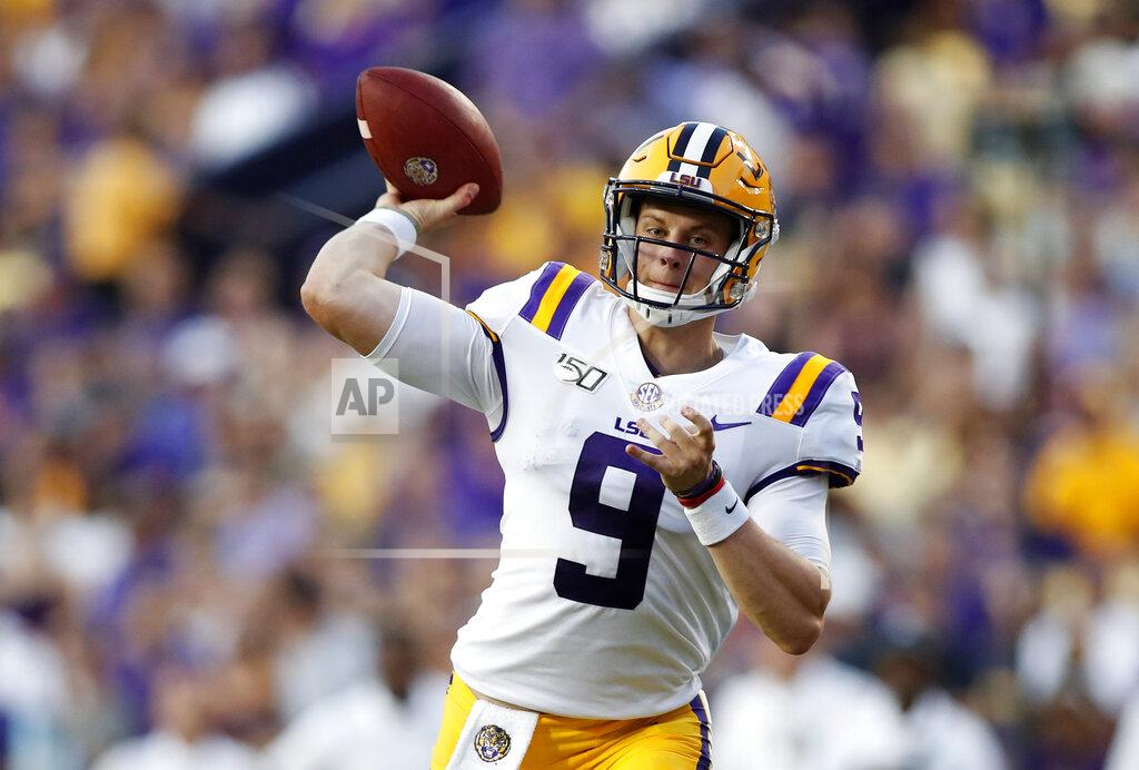 Tyler Kaufman FILE - In this Aug. 31, 2019, file photo, LSU quarterback Joe Burrows (9) throws a pass during the NCAA football team's game against Georgia Southern in Baton Rouge, La. LSU faces Texas this week. Burrow has accounted for 15 touchdowns in LSU’s last three games, including a school record-tying five TDs passes in the season opener, and is the first Tigers quarterback ever with 20 completions in four consecutive games. (AP Photo/Tyler Kaufman, File)