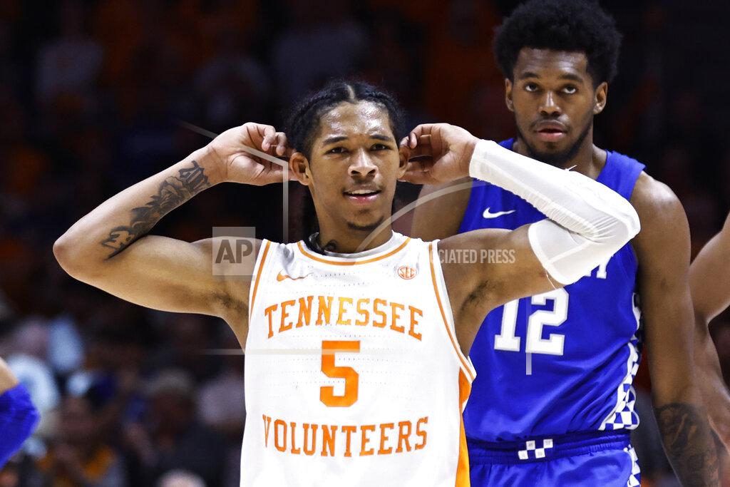 Wade Payne Tennessee guard Zakai Zeigler (5) gestures to fans he can't hear them during the second half of an NCAA college basketball game against Kentucky Tuesday, Feb. 15, 2022, in Knoxville, Tenn. Tennessee won 76-63. (AP Photo/Wade Payne)