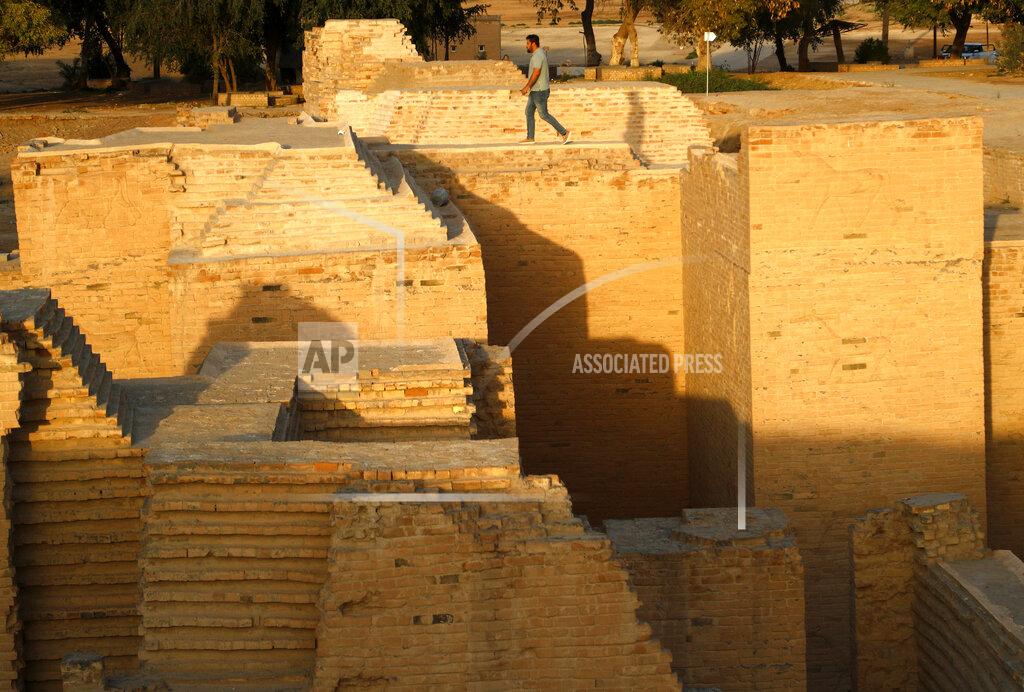 Hadi Mizban A man visits the archaeological site of Babylon, Iraq, Sunday, March 21, 2021. (AP Photo/Hadi Mizban)