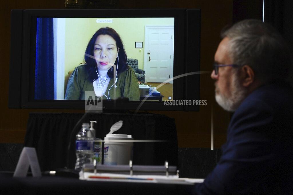 Kevin Dietsch Sen. Tammy Duckworth, D-IL, speaks virtually during a Senate Environment and Public Works Committee oversight hearing to examine the Environmental Protection Agency, Wednesday, May 20, 2020 on Capitol Hill in Washington, with Andrew Wheeler, administrator of the Environmental Protection Agency, left. (Kevin Dietsch/Pool via AP)