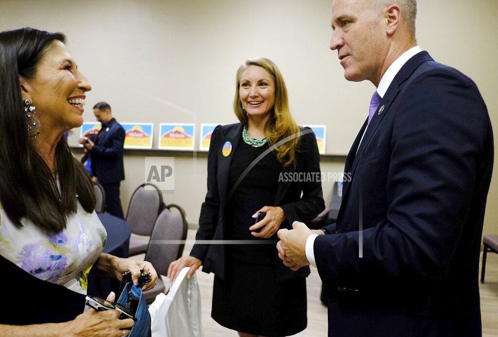 Adolphe Pierre-Louis From left, U.S. Rep. Teresa Leger Fernandez, Melanie Stansbury and U.S. Rep. Sean Patrick Maloney gather at the Hotel Albuquerque, Tuesday, June 1, 2021, in Albuquerque, N.M., as results come in for the New Mexico 1st Congressional District special election to fill former U.S. Rep. Deb Haaland's seat. Haaland resigned her seat to become United States Secretary of the Interior. Stansbury and Republican state Sen. Mark Moores are vying for the seat, as well as Independent contender Aubrey Dunn Jr., and Libertarian nominee Chris Manning. (Adolphe Pierre-Louis/The Albuquerque Journal via AP)