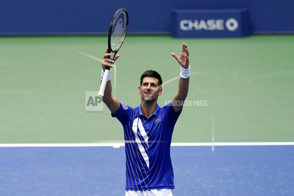 Seth Wenig Novak Djokovic, of Serbia, reacts after defeating Kyle Edmund, of Great Britain, during the second round of the US Open tennis championships, Wednesday, Sept. 2, 2020, in New York. (AP Photo/Seth Wenig)